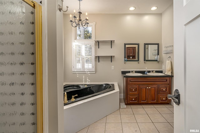 bathroom with double vanity, a stall shower, tile patterned floors, a sink, and a bath