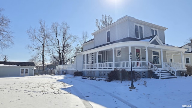 view of front of house with an outbuilding and a porch