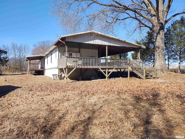 view of front of house with a wooden deck