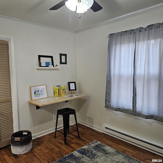 home office with a baseboard radiator, ornamental molding, dark wood finished floors, and baseboards