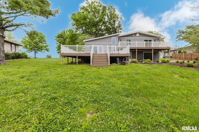 1437 Nassau Ln, Marion, IL 62959 - back of property with a wooden deck and a lawn