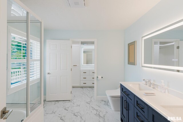 1437 Nassau Ln, Marion, IL 62959 - full bath featuring double vanity, marble finish flooring, toilet, baseboards, and a bathtub
