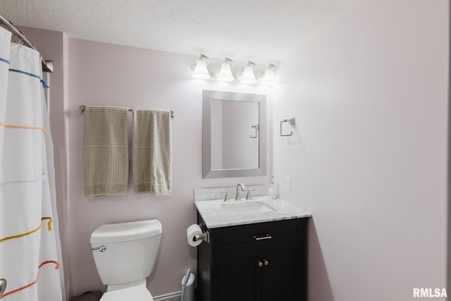 1437 Nassau Ln, Marion, IL 62959 - bathroom featuring vanity, toilet, and a textured ceiling