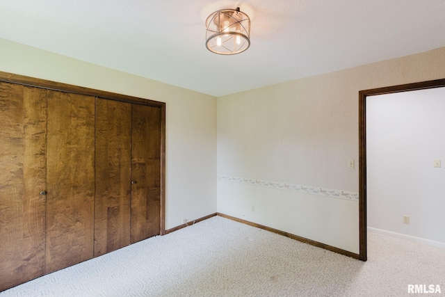 1437 Nassau Ln, Marion, IL 62959 - unfurnished bedroom featuring carpet flooring, baseboards, and a closet