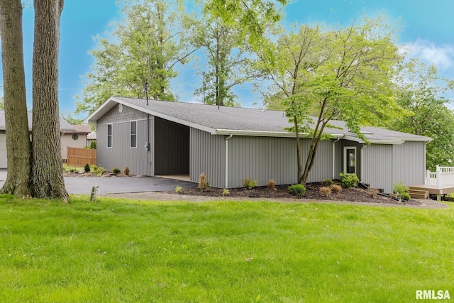 1437 Nassau Ln, Marion, IL 62959 - rear view of property featuring a carport, driveway, and a deck