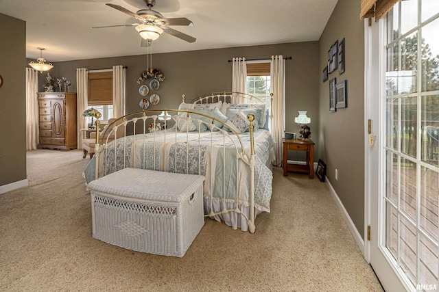 bedroom featuring carpet flooring, ceiling fan, and baseboards