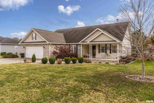 view of front facade with covered porch, brick siding, concrete driveway, and a front yard