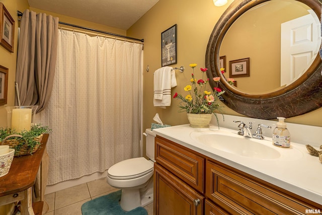 full bathroom with toilet, tile patterned flooring, and vanity