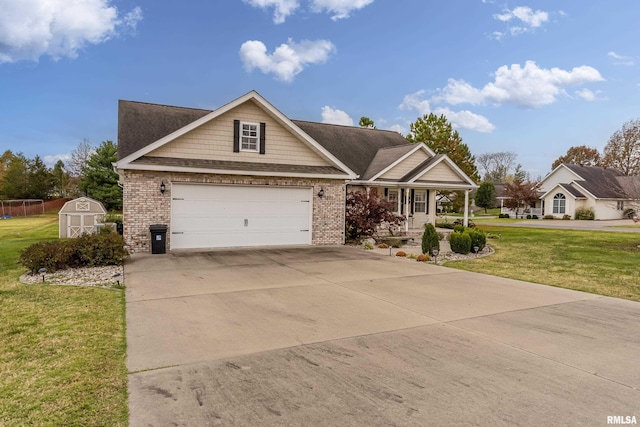 view of front facade with a storage unit, a front lawn, concrete driveway, and an outdoor structure