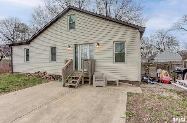 600 N Washington St, Sparta, IL 62286 - back of house featuring fence and a patio area