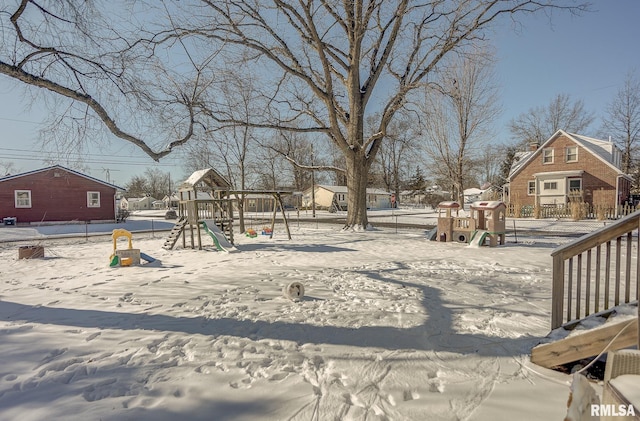 snowy yard with playground community