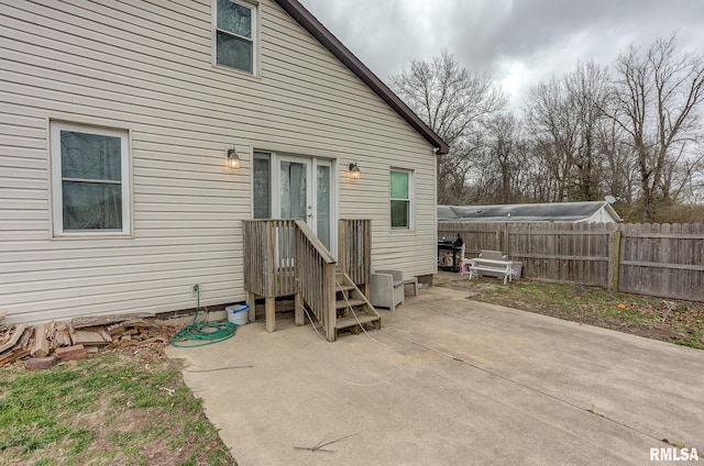 600 N Washington St, Sparta, IL 62286 - exterior space with entry steps, fence, and a patio