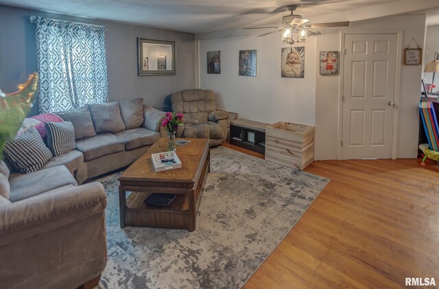 bedroom with a closet and wood finished floors