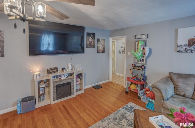 dining room featuring a ceiling fan and baseboards