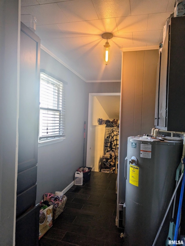 utility room featuring water heater