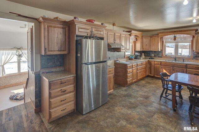 1548 Koehn Rd, Ava, IL 62907 - kitchen with freestanding refrigerator, backsplash, stone finish floor, and a sink