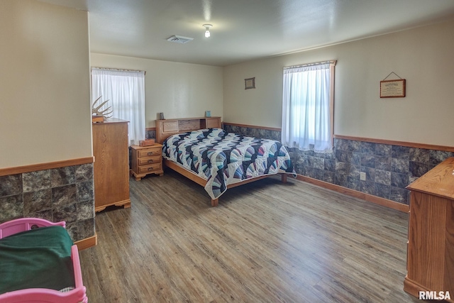 1548 Koehn Rd, Ava, IL 62907 - bedroom with a wainscoted wall, multiple windows, wood finished floors, and visible vents