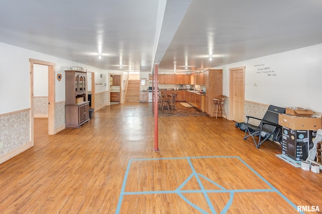 1548 Koehn Rd, Ava, IL 62907 - below grade area featuring stairway, wainscoting, and light wood finished floors