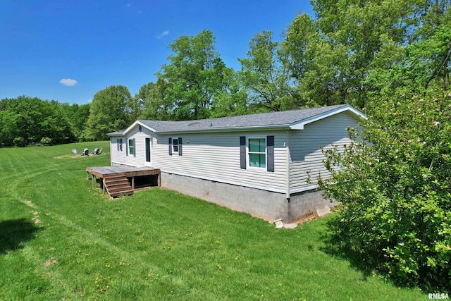 8065 E State Route 146th Hwy, Grantsburg, IL 62943 - rear view of property with a lawn, crawl space, and a shingled roof