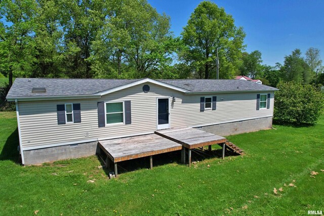 8065 E State Route 146th Hwy, Grantsburg, IL 62943 - back of property featuring a lawn, crawl space, a shingled roof, and a deck