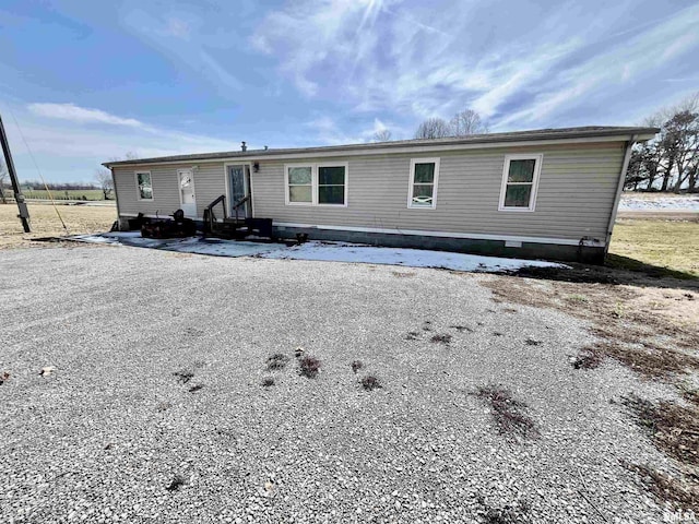 view of front of house featuring crawl space