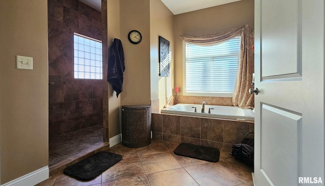 full bathroom featuring a walk in shower, tile patterned flooring, and a bath