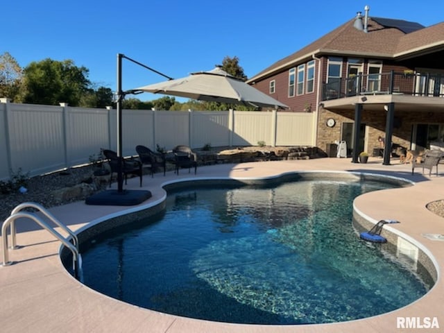 view of pool with a patio, a fenced backyard, and a fenced in pool