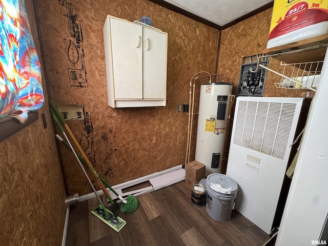 utility room with a heating unit and water heater