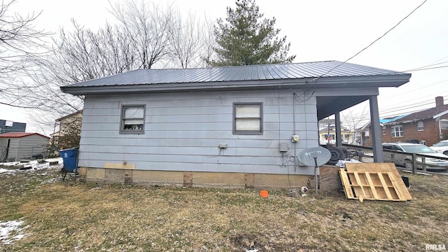 202 S Liberty St, Marion, IL 62959 - view of side of property featuring metal roof