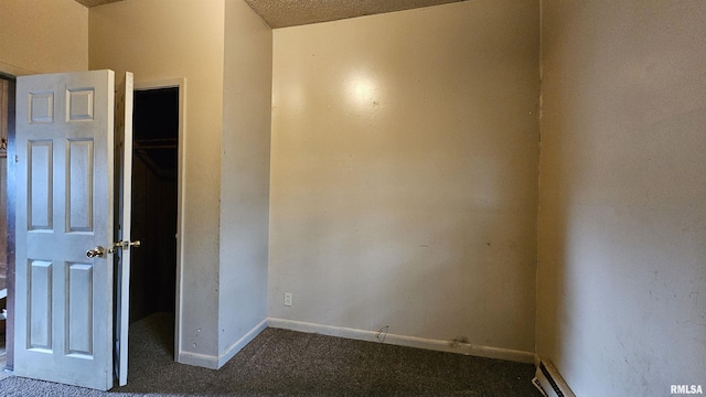 202 S Liberty St, Marion, IL 62959 - unfurnished bedroom with baseboards and carpet flooring