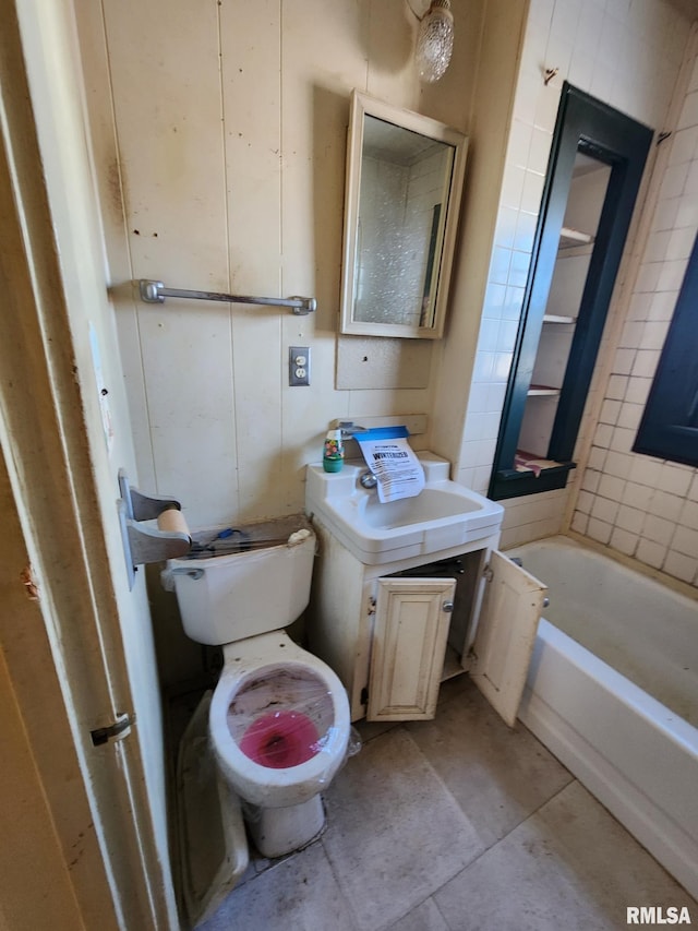 full bath with toilet, a tub, and a sink