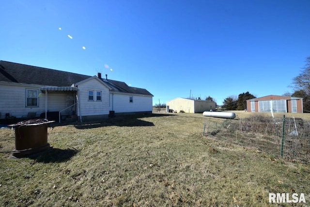 exterior space featuring an outbuilding