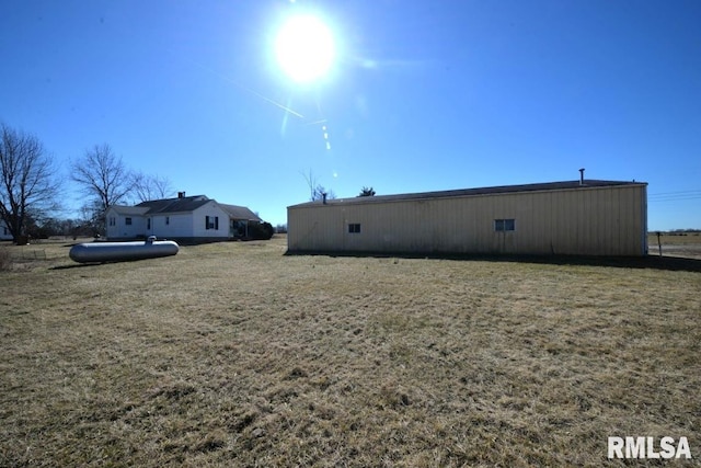 exterior space with an outbuilding and an outdoor structure