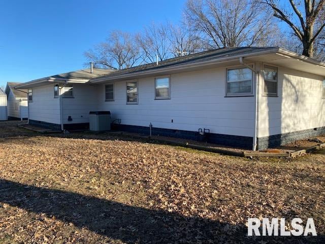 back of property with cooling unit