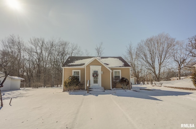 view of front of home with an outbuilding