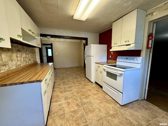 kitchen featuring white appliances, white cabinets, and under cabinet range hood