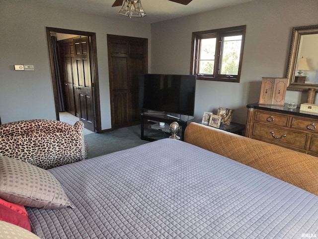 carpeted bedroom featuring a ceiling fan