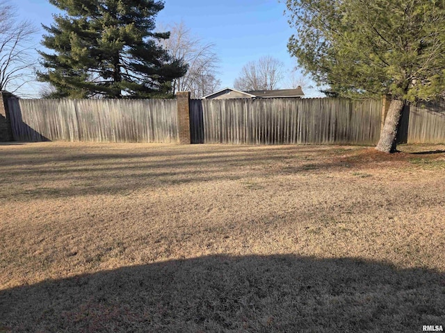 view of yard featuring fence