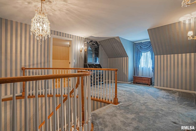 bonus room with baseboards, carpet flooring, and wallpapered walls