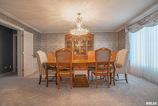 carpeted dining area with wallpapered walls, a notable chandelier, and crown molding