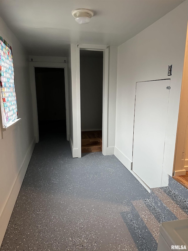 unfurnished bedroom featuring baseboards