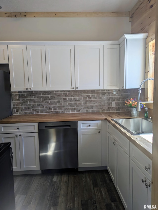 kitchen featuring decorative backsplash, stainless steel dishwasher, dark wood-type flooring, a sink, and butcher block countertops