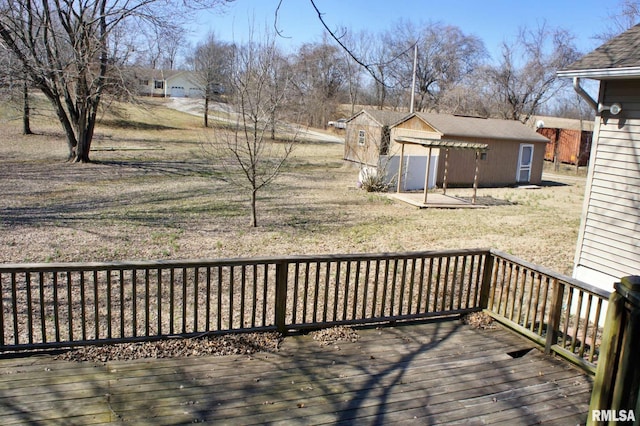 wooden deck with an outbuilding