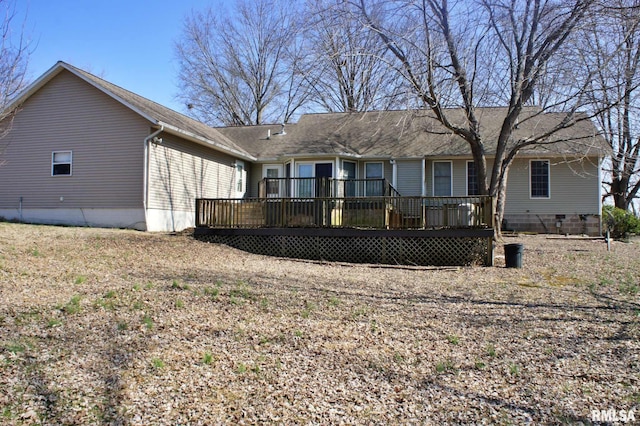 rear view of house with a deck