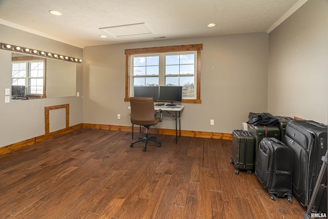 unfurnished office with attic access, baseboards, wood finished floors, and recessed lighting