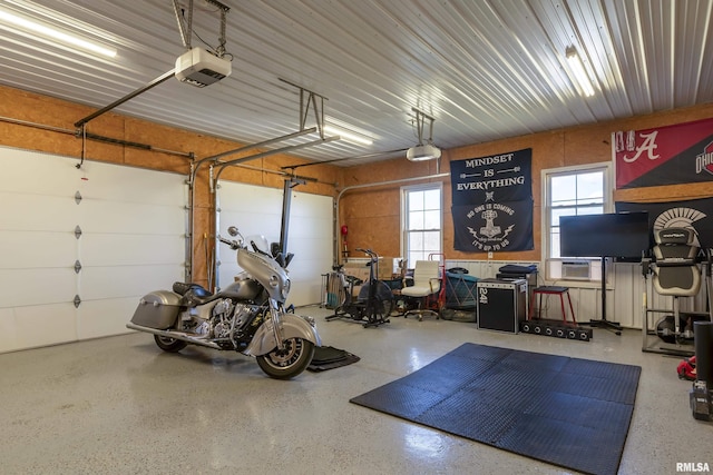 garage featuring a garage door opener