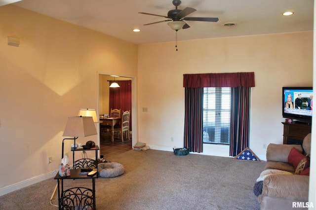 interior space with baseboards, visible vents, a ceiling fan, carpet floors, and recessed lighting