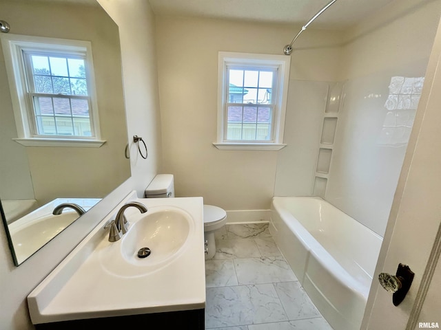 full bath with baseboards, toilet, marble finish floor, vanity, and shower / washtub combination