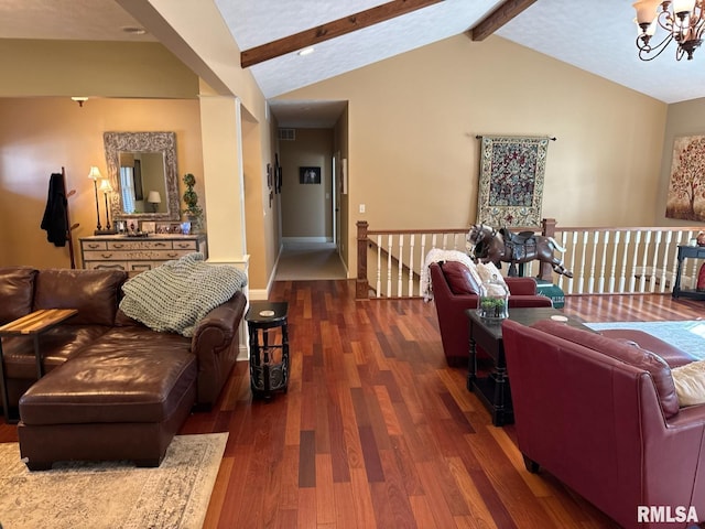 living room with visible vents, baseboards, lofted ceiling with beams, an inviting chandelier, and wood finished floors