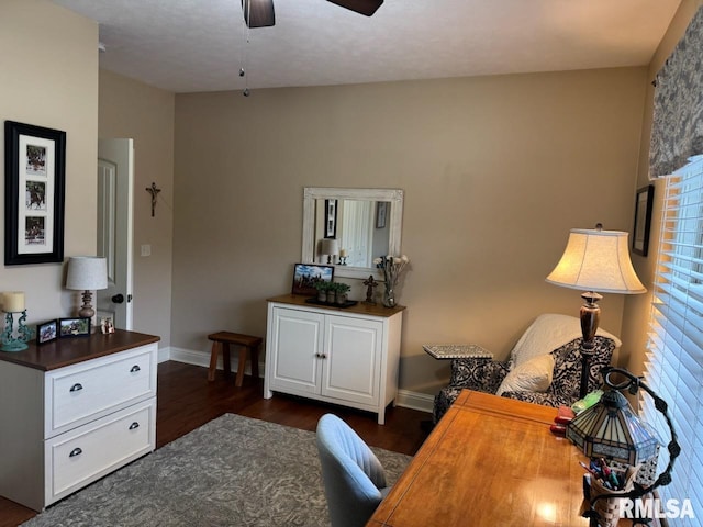 office space featuring ceiling fan, baseboards, and dark wood finished floors